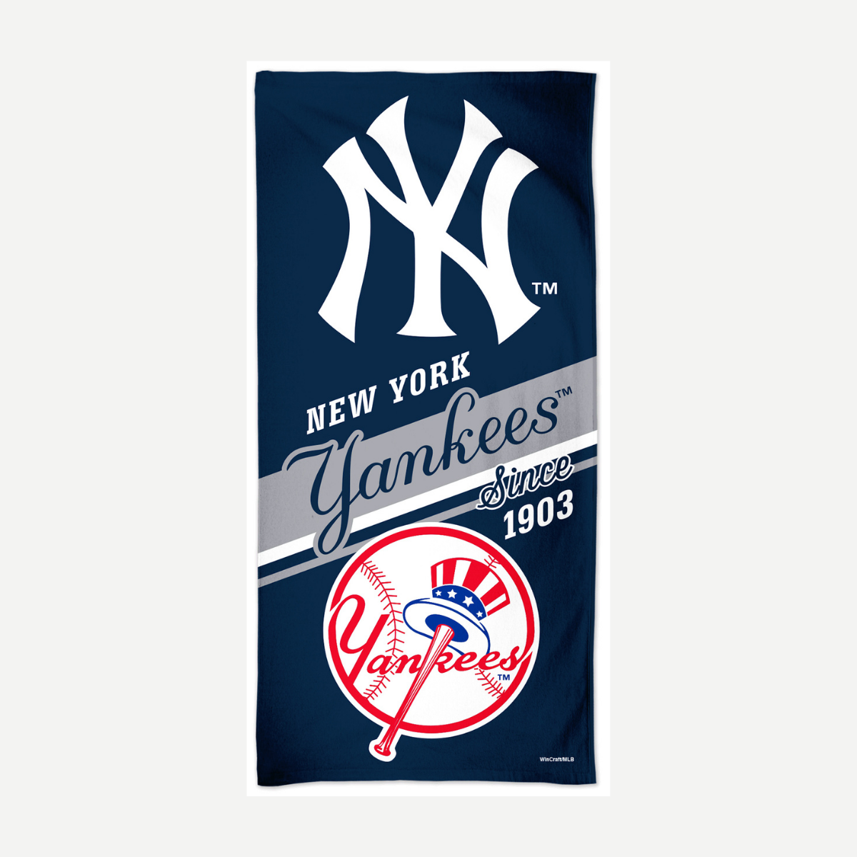 A navy blue New York Yankees velour beach towel featuring the team logo, text, and baseball graphic.