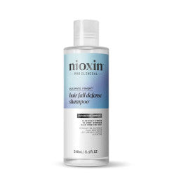 Nioxin Ultimate Power Hair Fall Defense Shampoo, white and blue bottle