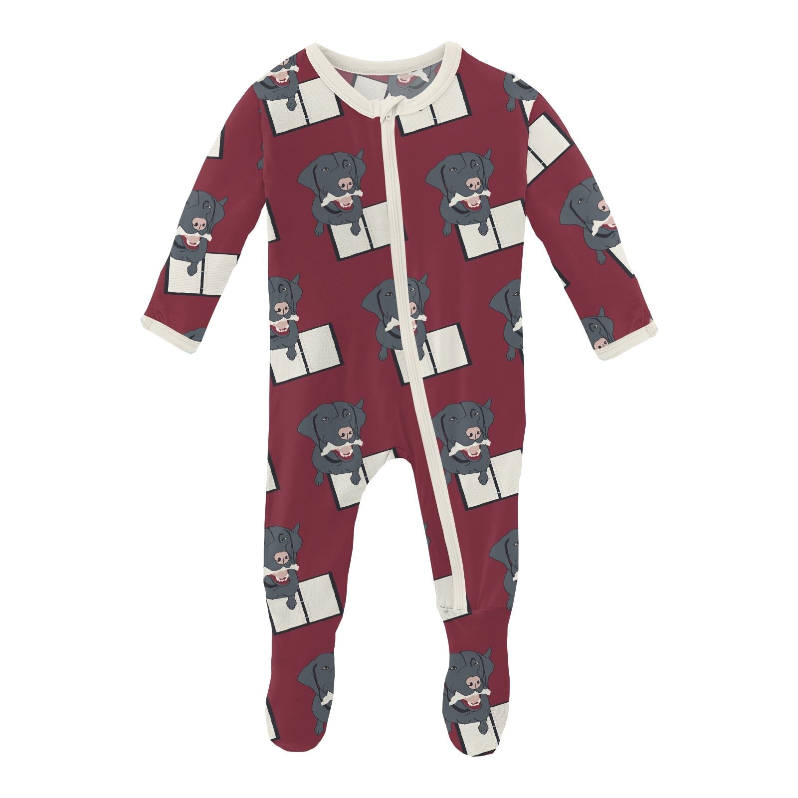 Baby footie pajama in deep red Wild Strawberry color featuring a repeating black lab dog print with a zipper closure.
