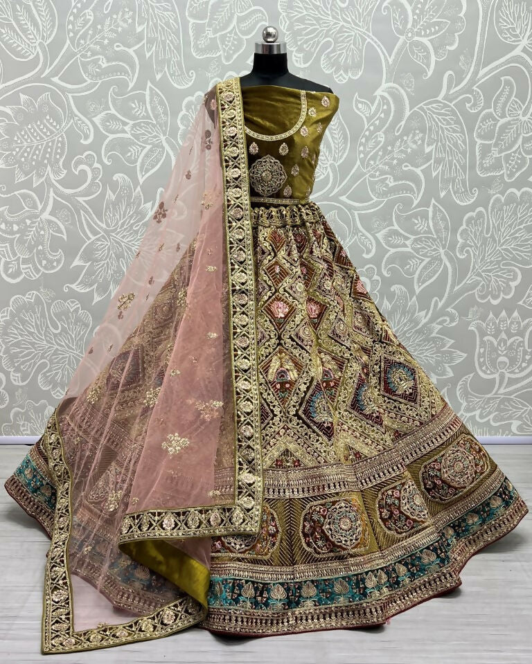Mehendi velvet wedding lehenga choli with heavy dori embroidery and zircon diamond work.