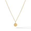 Close up of the North Star Necklace in 14k gold plated sterling silver on a minimalist background