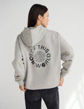 Not of This World Unisex Hoodie in Heather Greige with Romans 12:2 scripture print