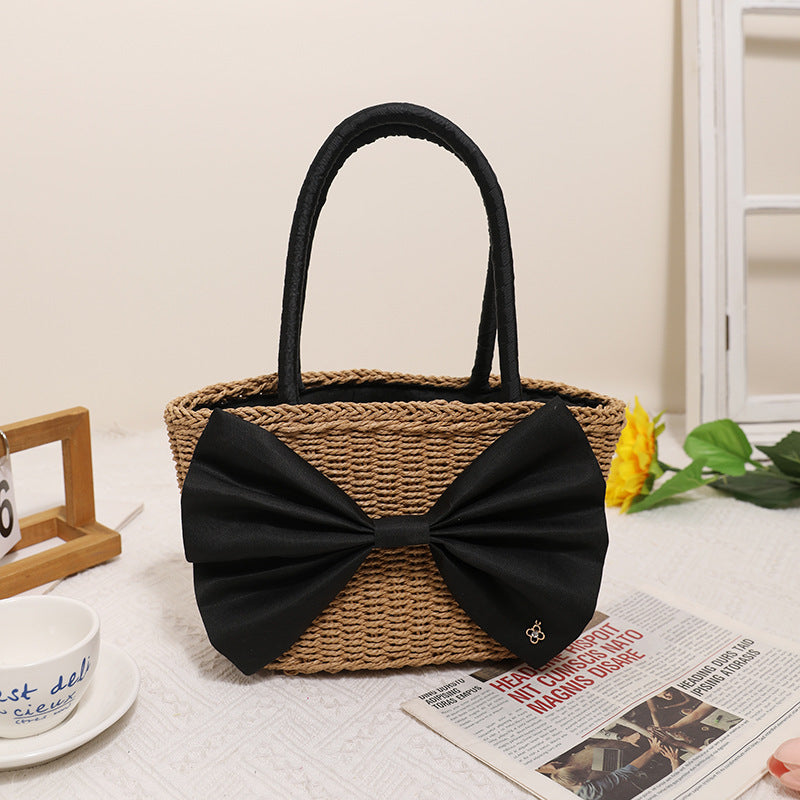 Woven Straw Beach Tote Bag with Large Black Bow Detail - Image 2