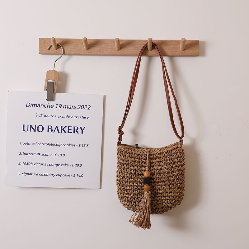 Woven Straw Crossbody Bag with Wooden Bead and Tassel Detail - Image 2