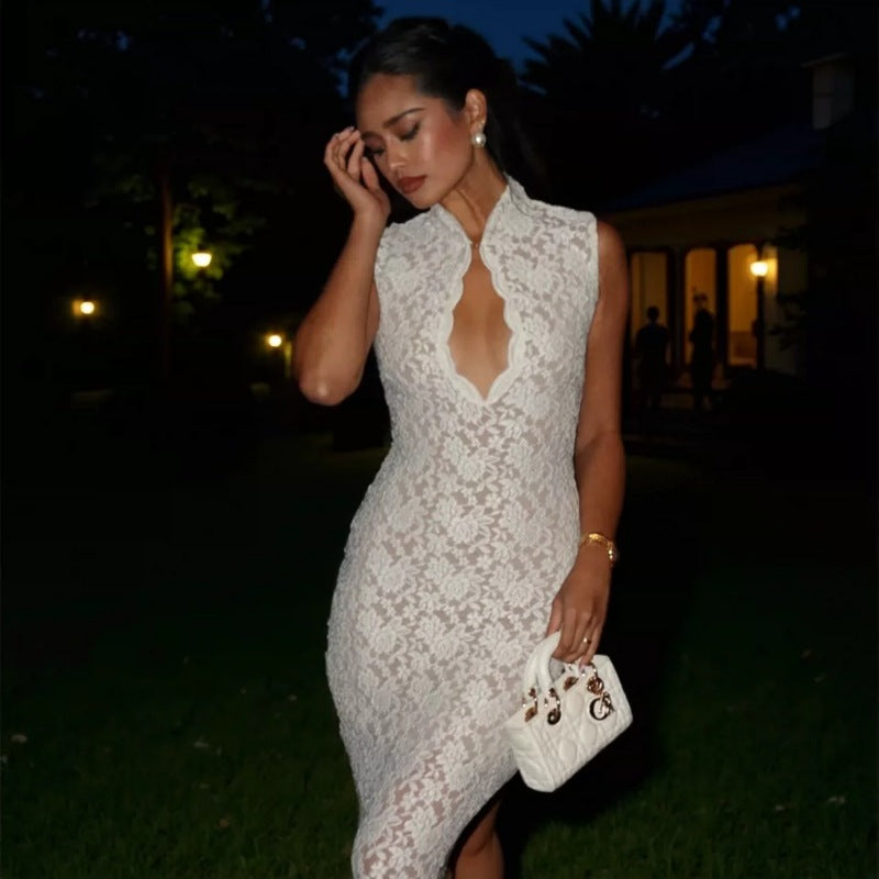 A slim-fit solid color knitted hollow out beach cover up for women