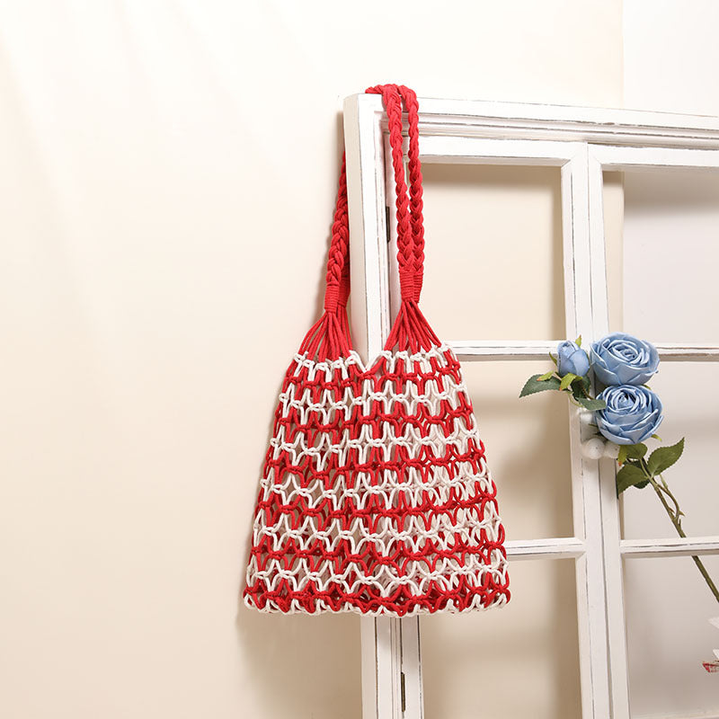 Close up of a colorful woven macrame tote bag suitable for beach use.