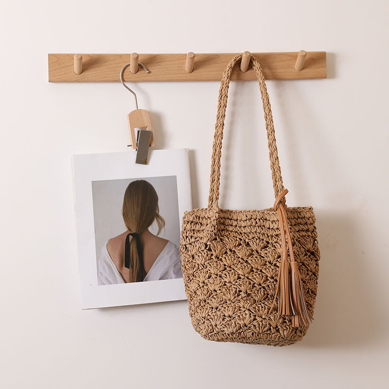Woven Straw Shoulder Bag with Decorative Tassel and Cutout Design - Image 2