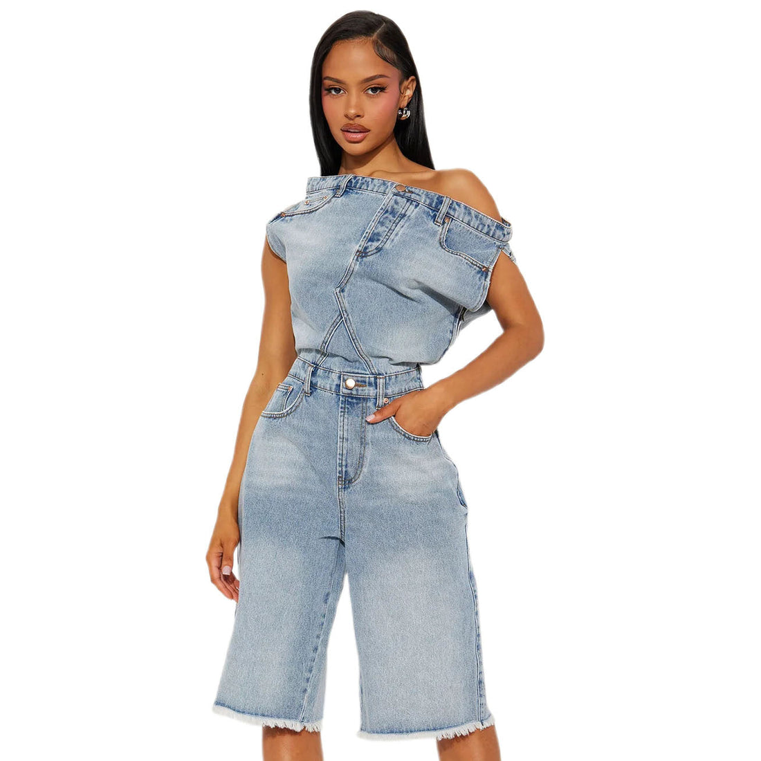 Women wearing a casual BY CLAUDE blue denim romper featuring a flattering fit