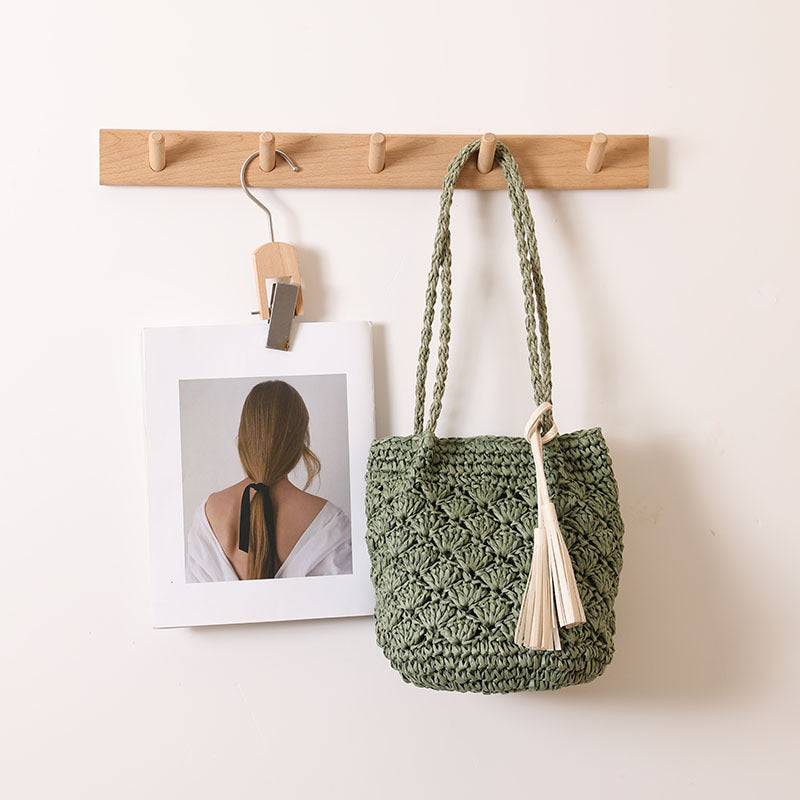 Woven Straw Shoulder Bag with Decorative Tassel and Cutout Design - Image 4