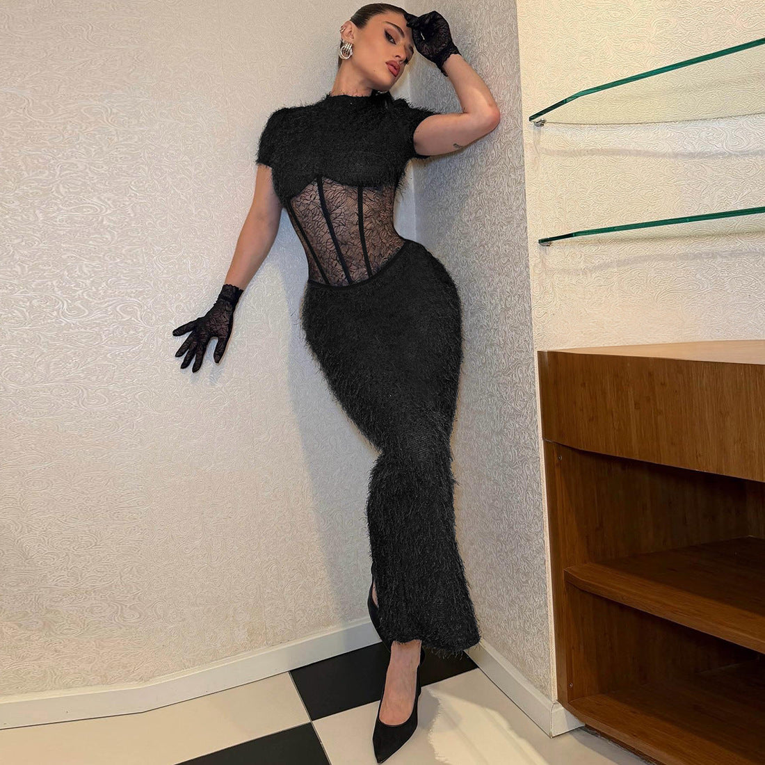 Elegant slim-fit dress featuring see-through lace detailing, stand collar, and leg split.