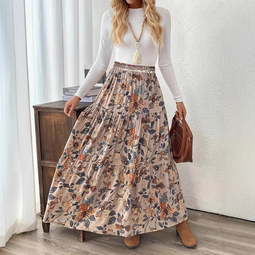 Woman wearing a floral printed bohemian asymmetric midi skirt in peacock green, styled for a casual look.