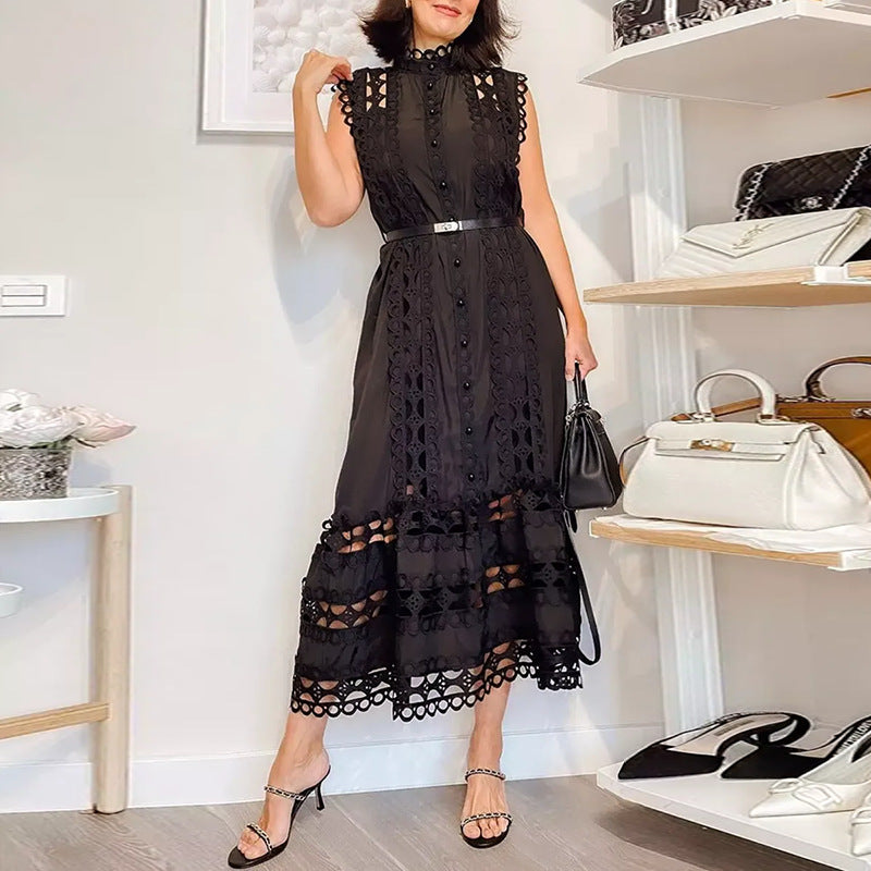 Elegant high-waist dress featuring intricate embroidery stitching details in a solid color finish.