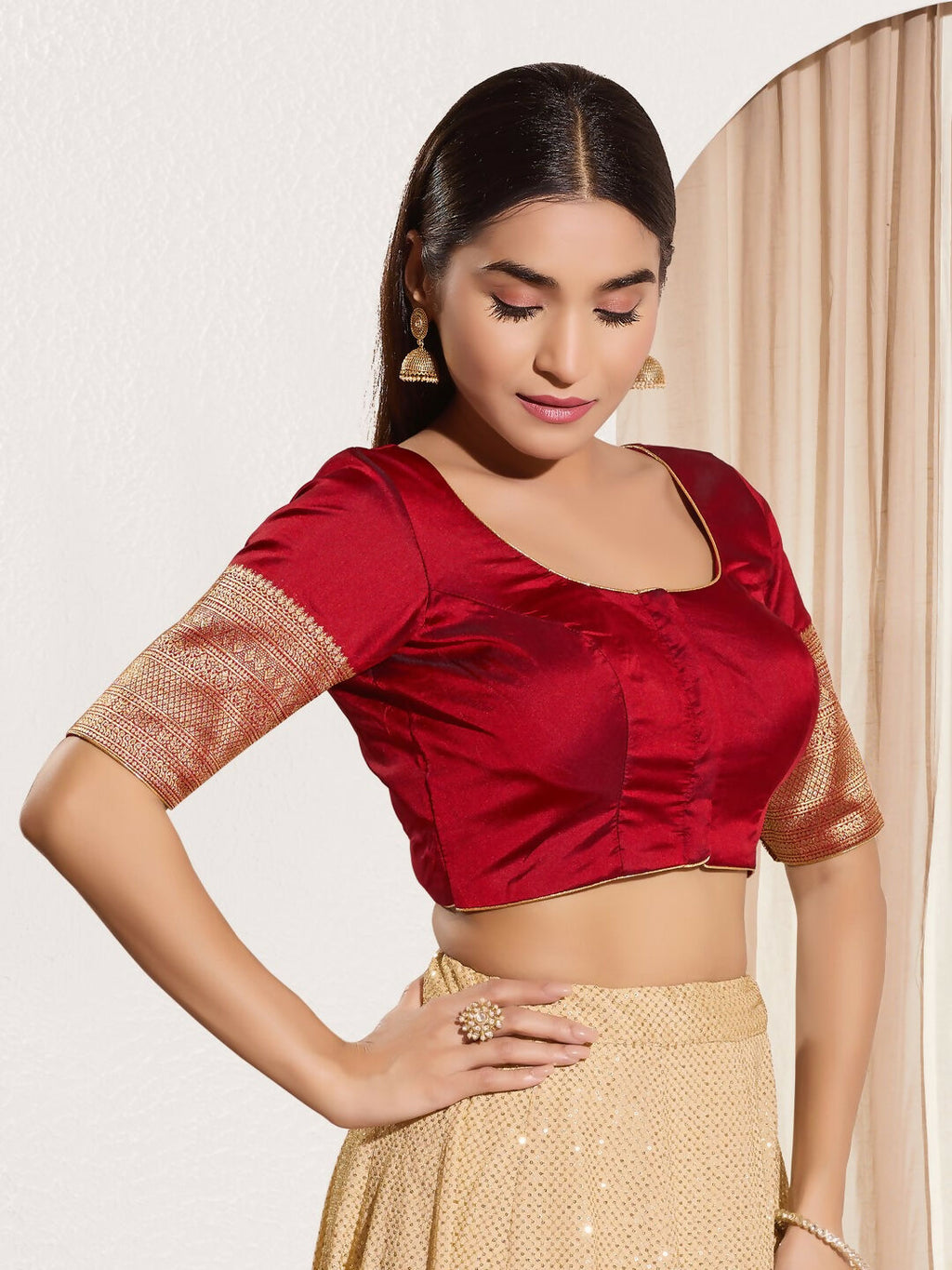 Maroon taffeta silk padded blouse with round neck and elbow length sleeves