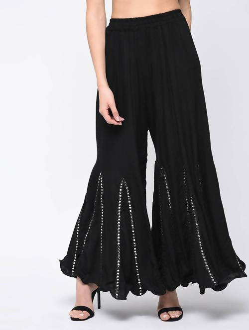Black flared palazzo pants with mirror lace work detail on viscose rayon cotton fabric