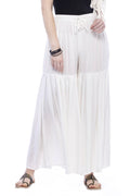 A pair of crisp off-white rayon cotton solid palazzo pants with a comfortable relaxed fit.