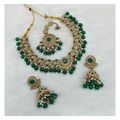 Exquisite green stone work necklace set with matching drop earrings for traditional wear