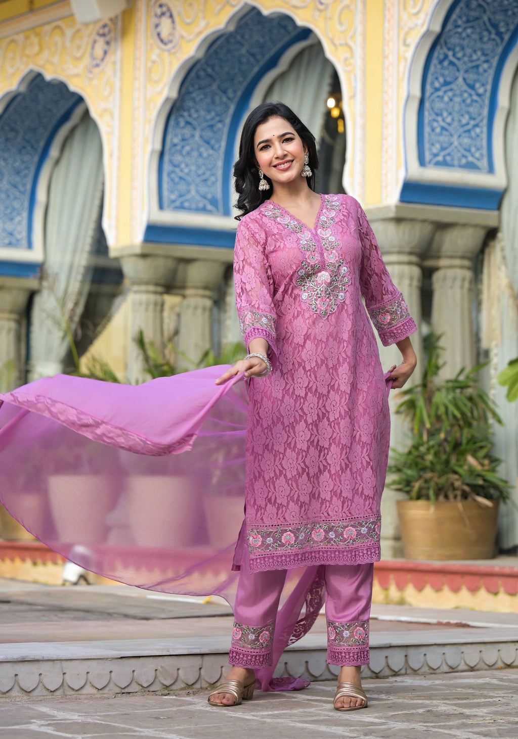 Lavender net kurta with embroidery, matching pants, and lace dupatta set.
