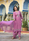 Lavender net kurta with embroidery, matching pants, and lace dupatta set.
