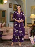 Violet cotton kurta with intricate neckline embroidery and floral print, styled with matching palazzo pants.