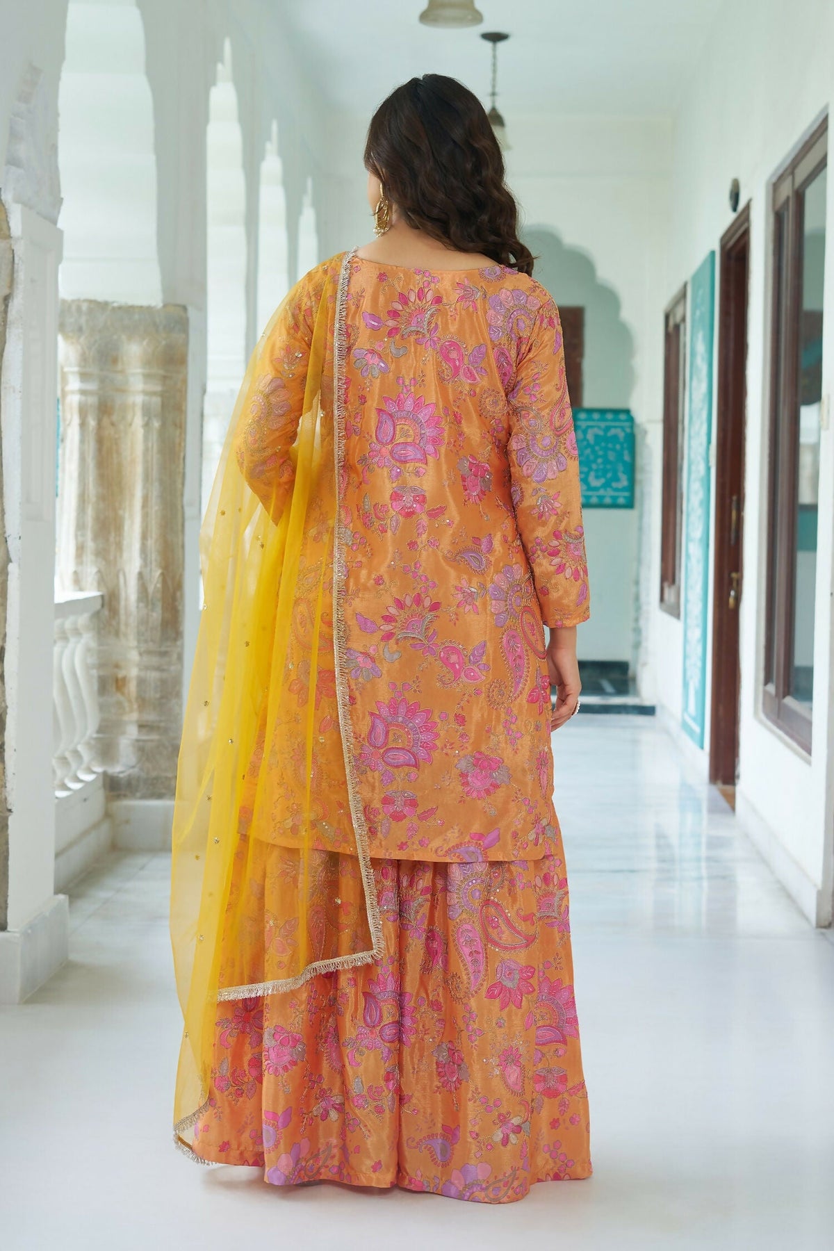 Yellow Chinnon Kurta Set with Intricate Embroidery and Sequence