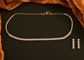 Golden White Jadau Kundan and Pearl necklace set with earrings.
