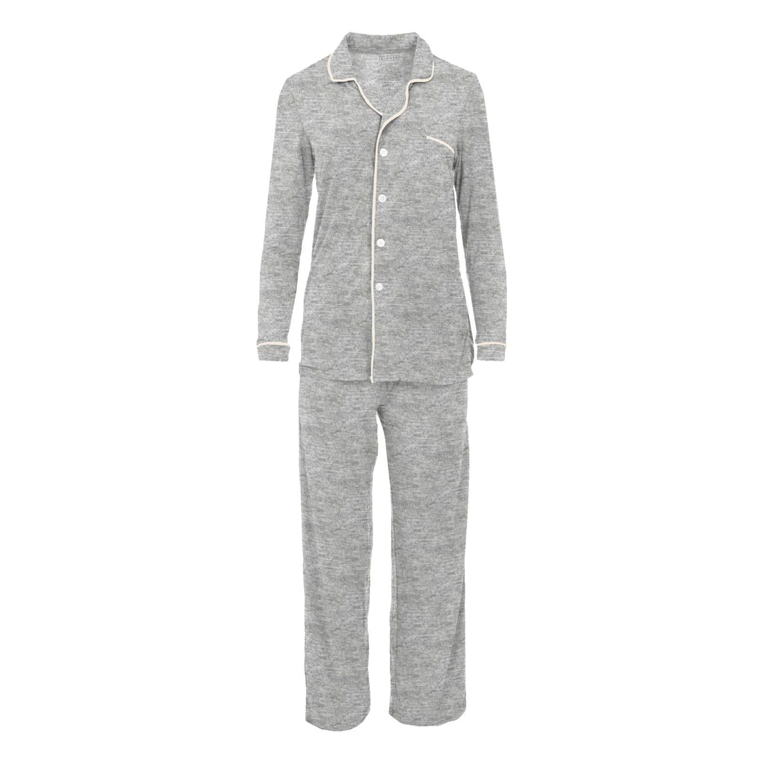 A woman wearing a soft heathered mist grey long-sleeved collared button-up pajama set with relaxed fit pants.
