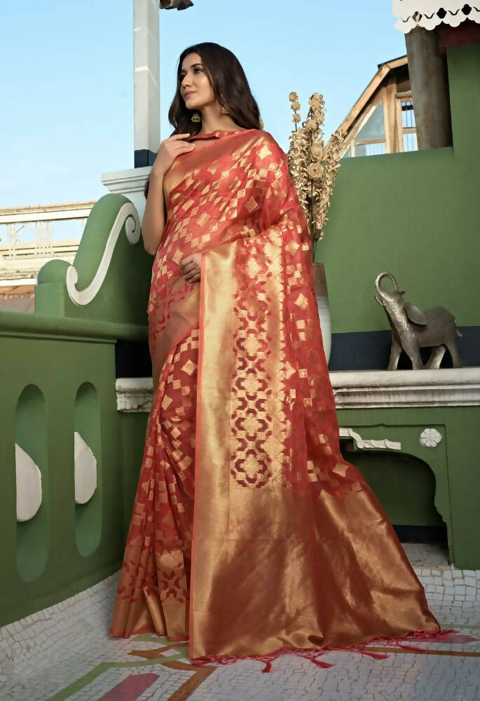 Light Tomato Red Organza Silk saree with intricate weaving and matching tassel hem