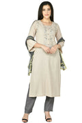 Woman wearing a stylish 3-piece beige cotton rayon kurta set with matching dupatta