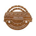 3D wooden USA map travel tracker in oak finish featuring white engraved state details on a circular wood panel.