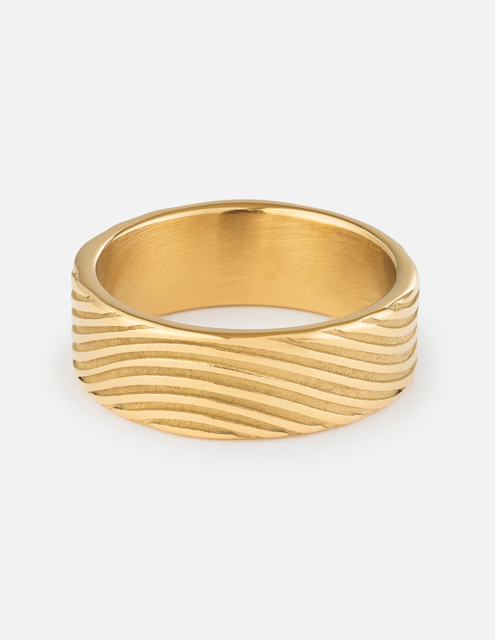 Close up of the Obey Him Ring, a minimalist faith-based accessory worn on a finger.