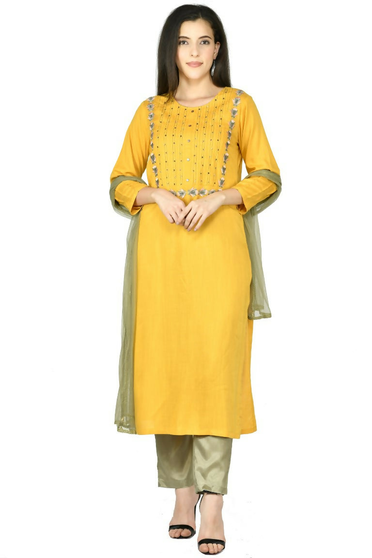 Model wearing a three-piece mustard cotton rayon kurta set with matching dupatta
