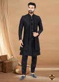 Men wearing a black heavy art silk straight kurta and jacket Indowestern set