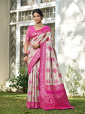 Elegant cream and pink silk blend saree with matching blouse draped gracefully