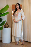 Off-white pure Khadi cotton kurta pant set with floral embroidery and sequence work details.