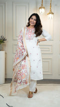 Offwhite Roman Silk kurta set featuring delicate multi-color embroidery and sequence work, including matching pants and dupatta.