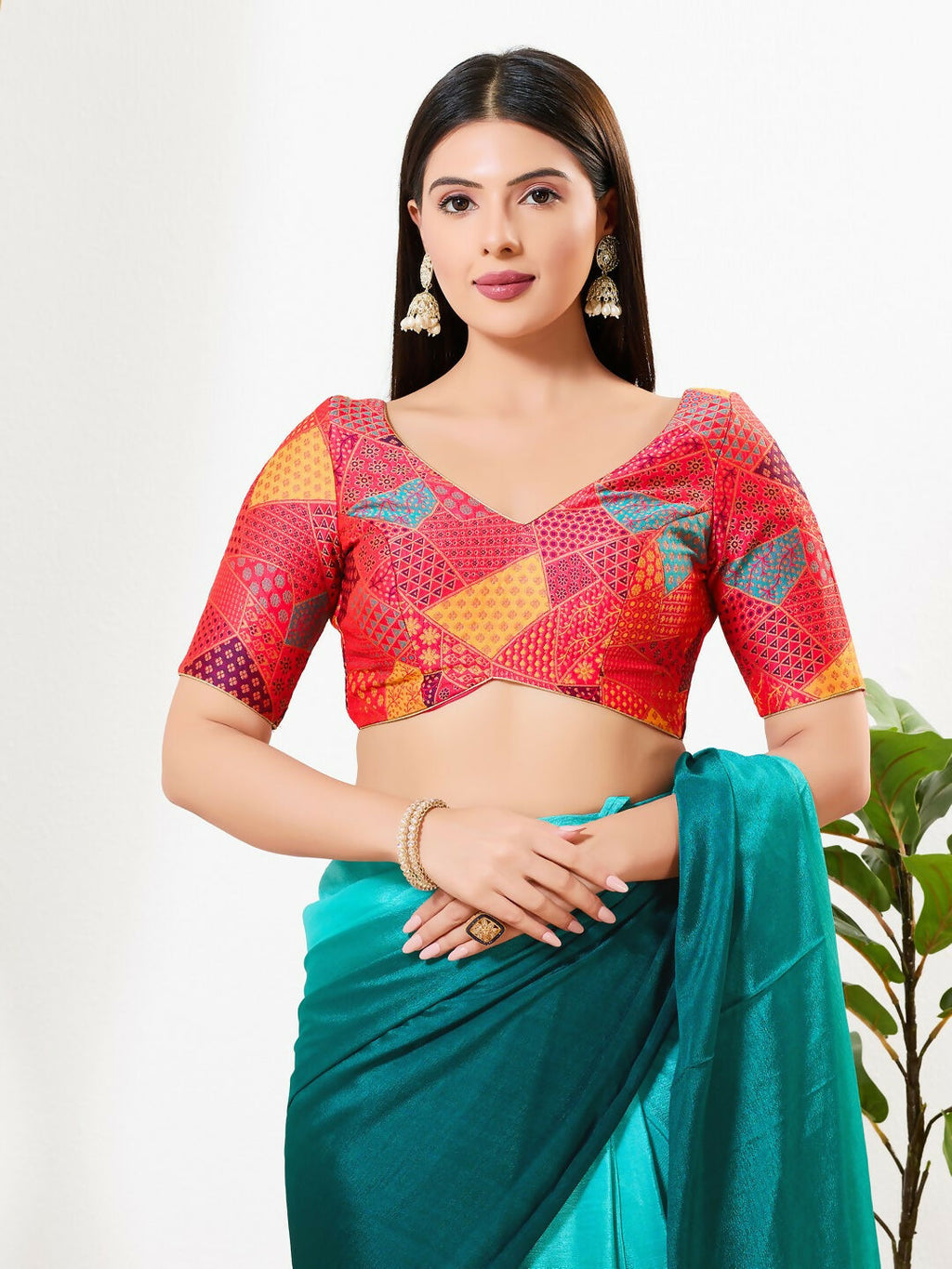 Red brocade padded blouse with V-neckline and elbow sleeves