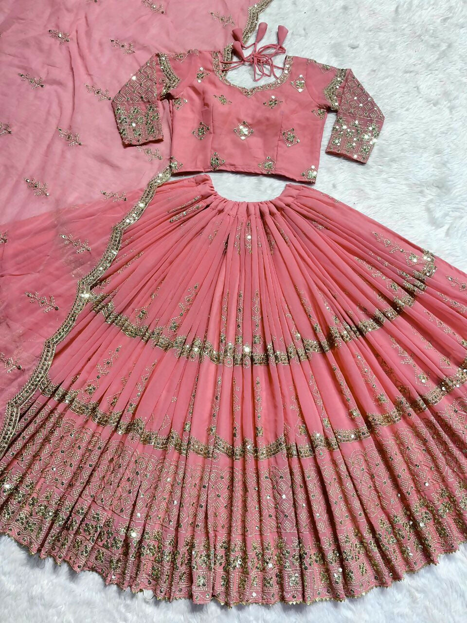 Baby Pink Faux Georgette Sequins Zari Embroidered Lehenga Choli
