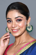 Traditional Kundan Pearl earrings with green and golden details