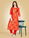 Women wearing a bright orange embroidered viscose rayon straight kurta pant set