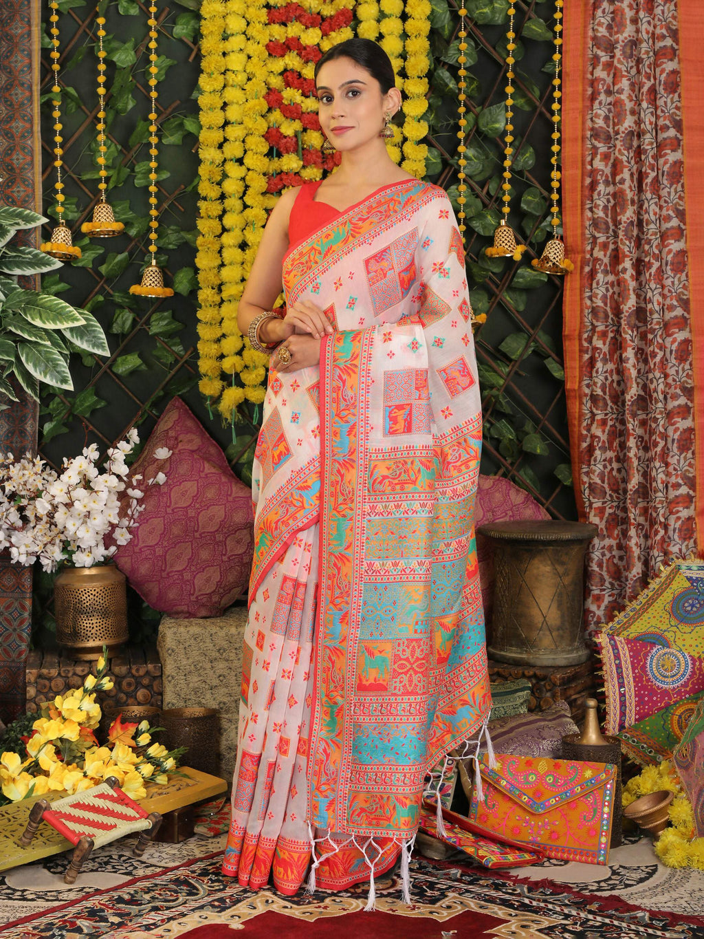 Minimalist white linen cotton saree with a matching blouse.