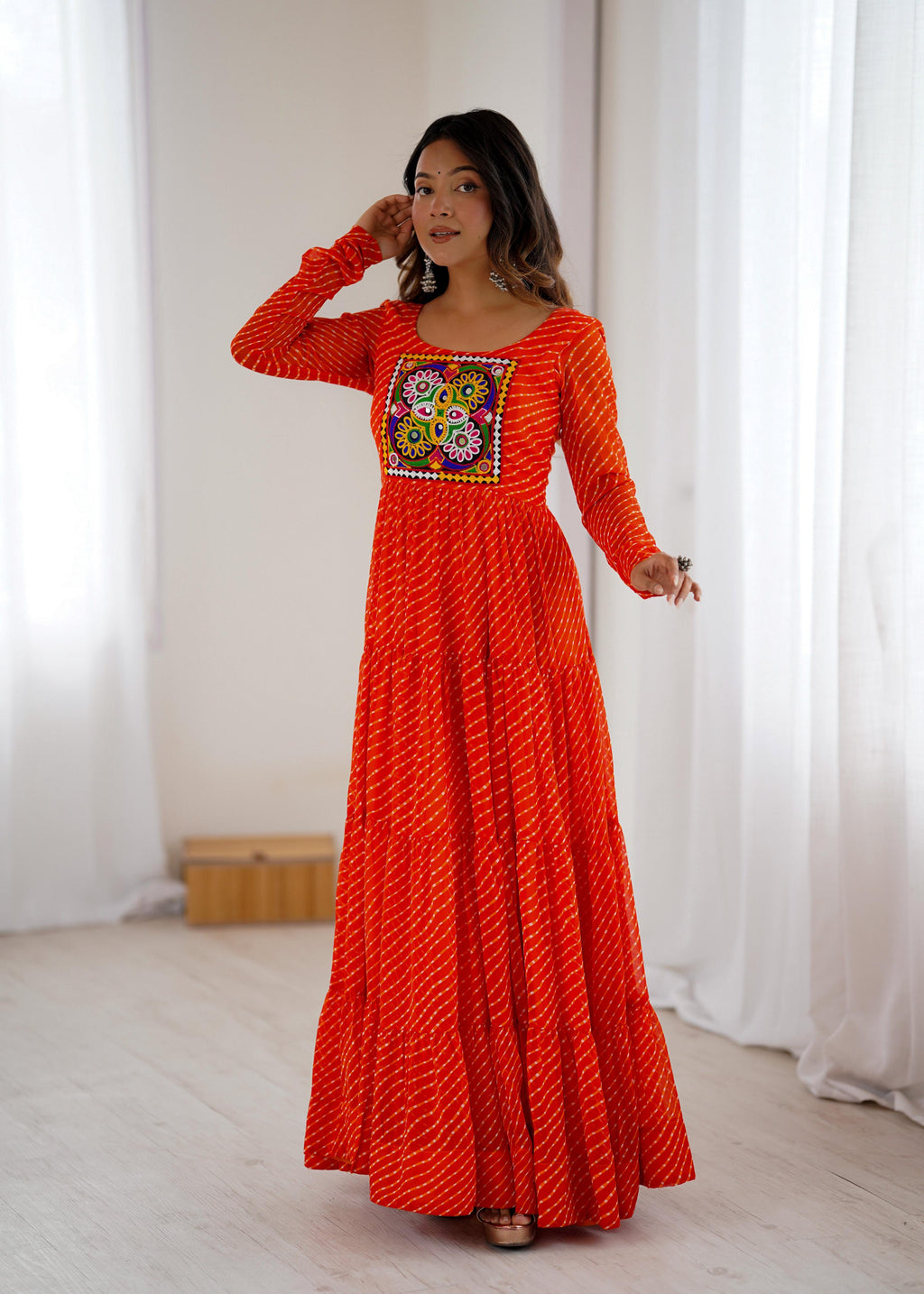 Orange and multi-color leheriya print Anarkali gown in faux georgette with Gamthi work yoke