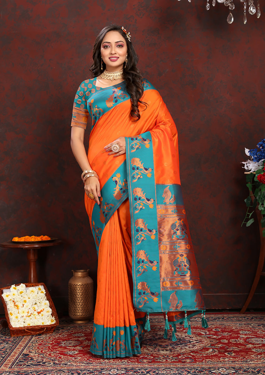 Vibrant orange soft Paithani silk saree with intricate Zari and Meenakari weaving