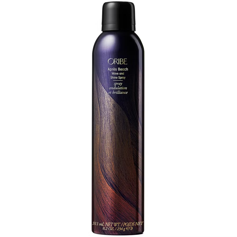 Oribe Apres Beach Wave and Shine Spray bottle in purple and black gradient packaging.
