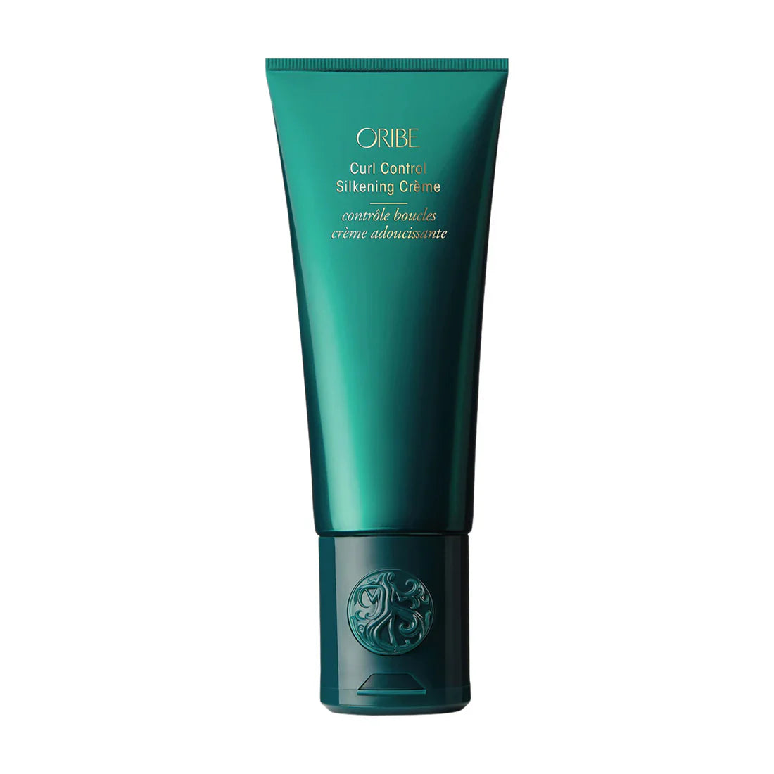 Oribe Curl Control Silkening Crème in a deep emerald green tube with gold text.