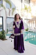 Purple velvet readymade kurta set with intricate embroidery and sequence work details.