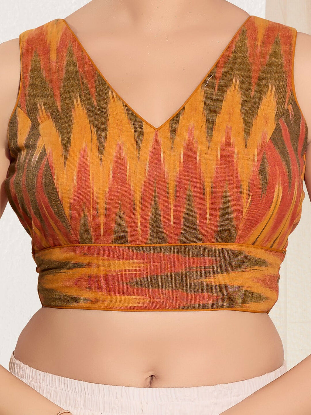 Joban Fashion Mustard Ikat Silk Padded Blouse With V Neck Sleeveless
