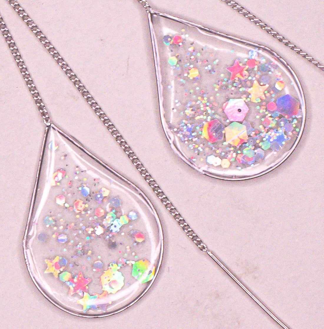 Elegant Ánh Dương silver threader earrings featuring a polished finish.