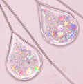 Elegant Ánh Dương silver threader earrings featuring a polished finish.