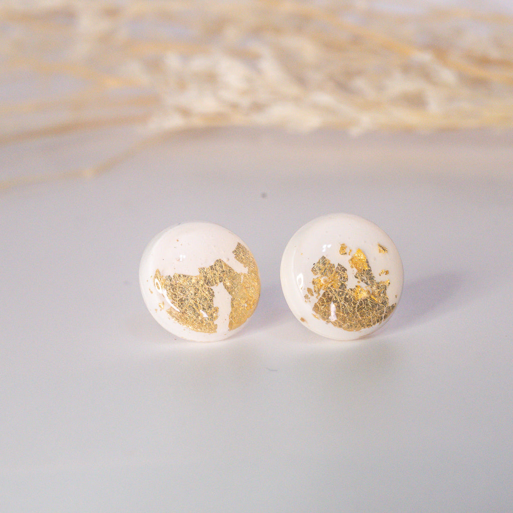 Ngọc Nắng white minimalist stud earrings with gold flakes