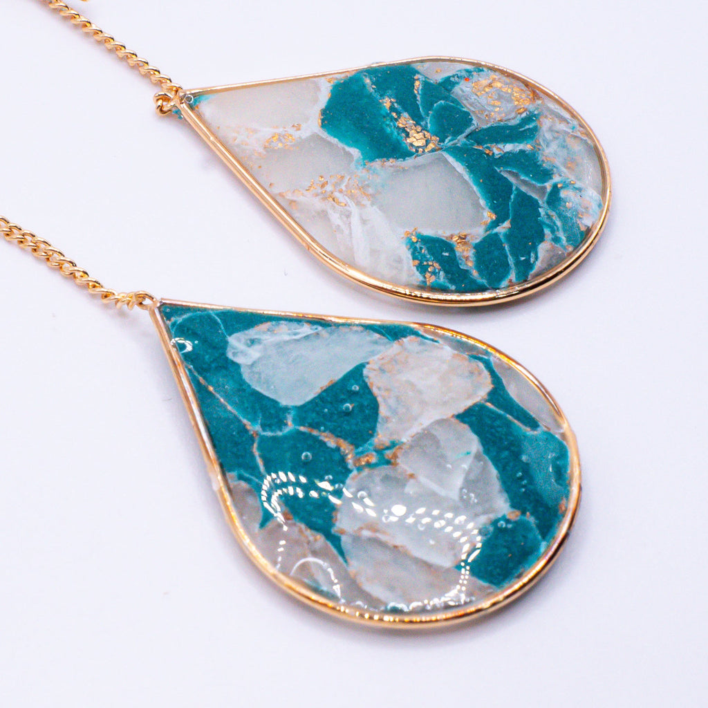 Close up of Ashley Teal Marble Gold Ear Threaders showing lightweight polymer clay finish